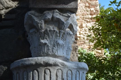Ancient Stone Column in Front of Old Church in Pavia