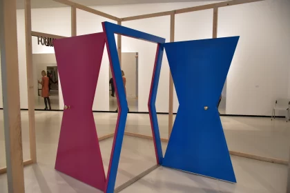 Abstract Sculpture Artwork: A Room with Pink and Blue Doors