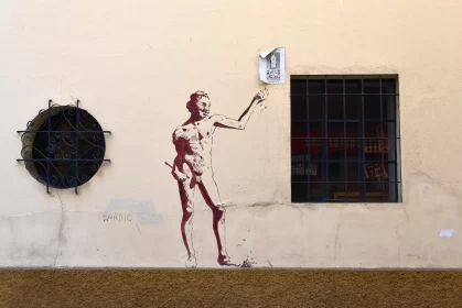Stunning Street Art: Man with Bat in Maroon and Beige
