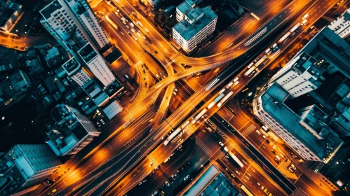 Nighttime Bustle: Aerial View of a Vibrant Chinese City Intersection