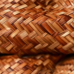 Brown Woven Straw Mat with Geometric Pattern