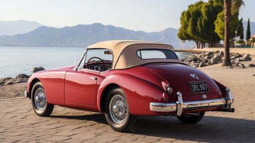 Red Vintage Jaguar XK120 Convertible by the Lake