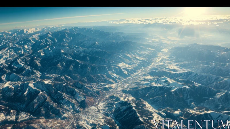 Breathtaking Aerial View of Snow-Covered Mountain Range AI Image