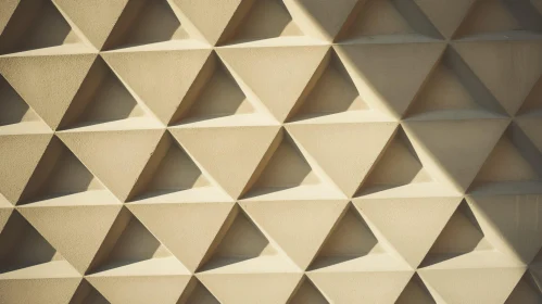 Beige Triangle Geometric Pattern on Concrete Wall