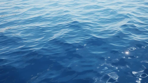 Ocean Surface in Deep Blue - Sun Reflections and Ripples