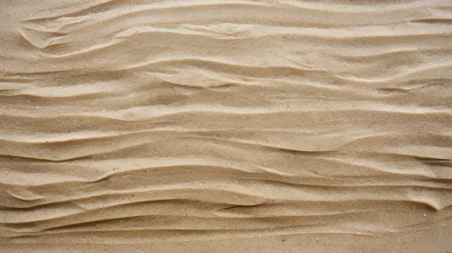 Beige Sand-Like Surface with Wavy Ripples