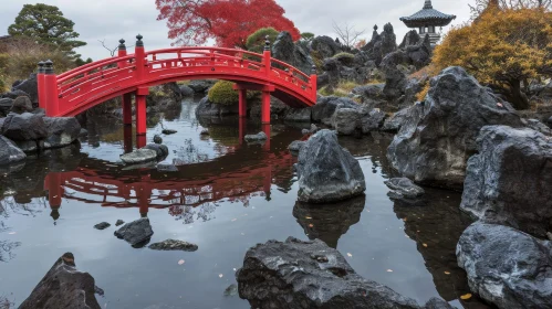 Tranquil Japanese Garden Landscape with Red Arched Bridge