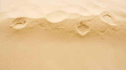 Sand Dune and Footprints - High Angle View