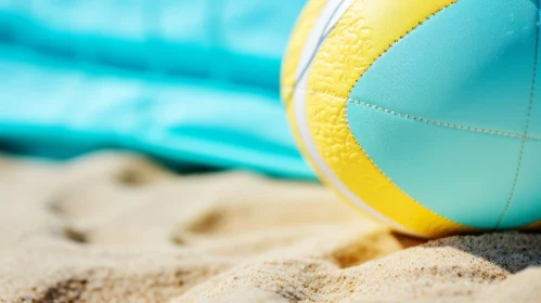 Yellow and Blue Volleyball on Sandy Beach