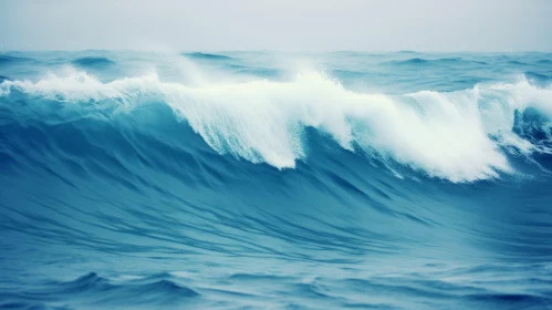 Ocean Wave Power - Captivating Image of Foamy Blue Wave
