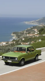 Captivating Green Car on Road Beside the Ocean | Mediterranean Landscapes