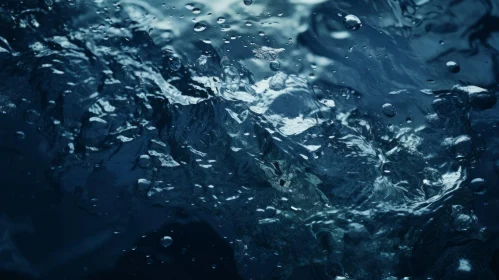 Blue Water Surface with Splashes and Bubbles
