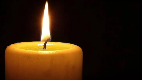 Burning Candle Close-up - Dark Background