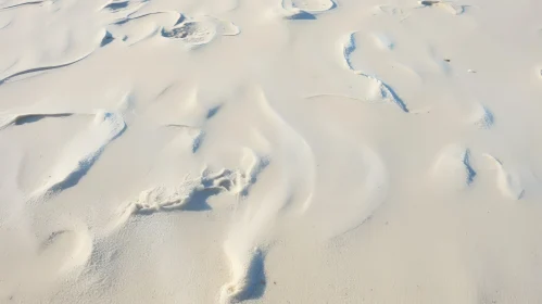 White Sand Texture and Footprints