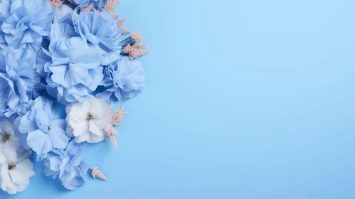 Blue and White Flower Bouquet on Light Blue Background