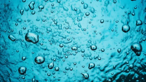 Blue Bubbles in Water Abstract Image