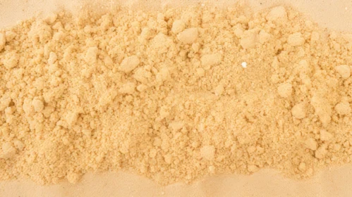 Golden Dry Sand Texture Close-Up
