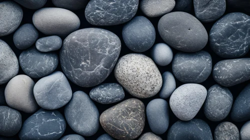 Close-Up Smooth Pebbles on Black Background