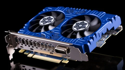Blue and Black Graphics Card with Fans on Reflective Surface