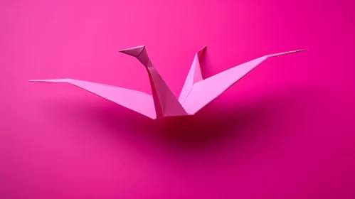 Elegant Pink Origami Crane on Pink Background