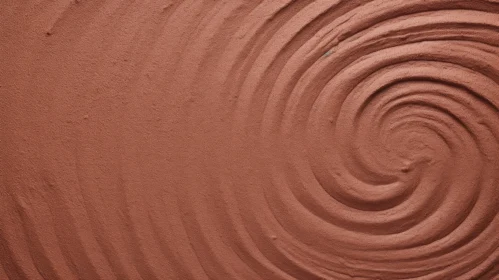 Deep Red Clay Surface with Spiral Pattern