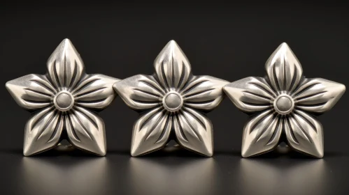 Silver Metal Flowers Close-Up on Black Background