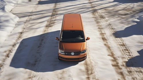Brown Volkswagen Van on Snowy Road