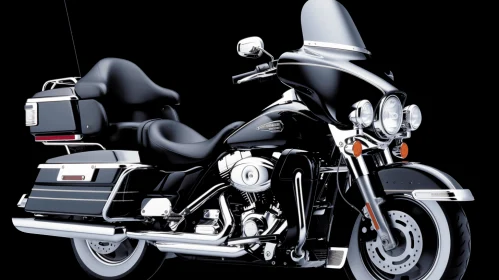Captivating Black and Silver Motorcycle with Leather Seating and Windshield