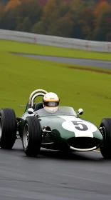 Vintage Race Car Speeding on Track - Exciting Racing Action