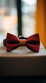 Red Bow Tie with Yellow Pattern - Fashion Accessory Close-Up