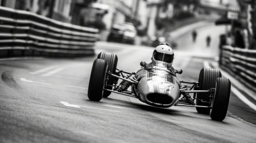 Vintage Open-Wheel Race Car Speeding Through City Street
