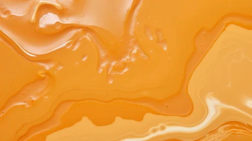 Smooth Orange Liquid with Wavy Surface and Bubbles
