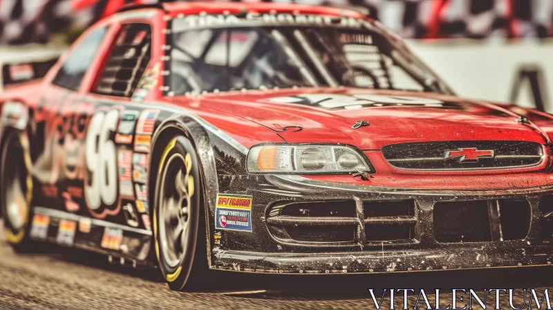 Red and Black Race Car on Blurred Background AI Image
