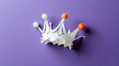 Unique Paper Crown with Pom-Poms on Purple Background