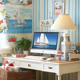 Nautical Desk Decor with Sailboat Wallpaper and Monitor Display