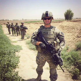 Soldier in Uniform with Gun