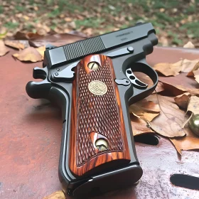 Black Handgun Featuring Carved Wooden Grip