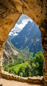 Majestic Mountain Valley Framed by Cave