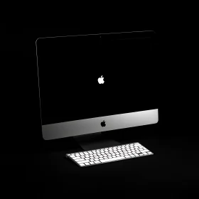 Modern Apple iMac with Glowing Logo