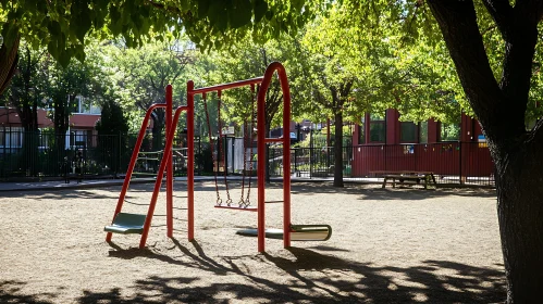 Red Swing Set in Green Park