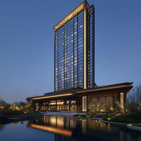 Night Illuminated Tall Building with Water Reflection