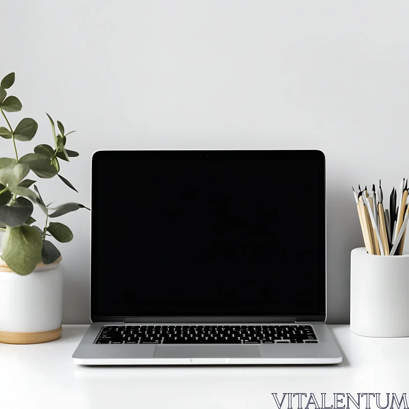 Clean Desk Setup with Laptop and Potted Plant AI Image