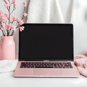 Stylish Pink Laptop with Soft Surroundings