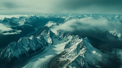 Elevated View of Snowy Mountains and Clouds