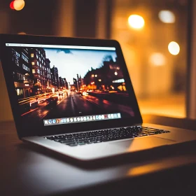 City Lights on Laptop Screen in Cozy Setting