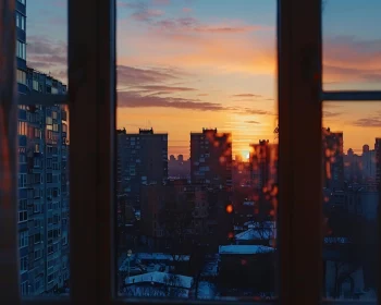 Urban Sunset View from Window