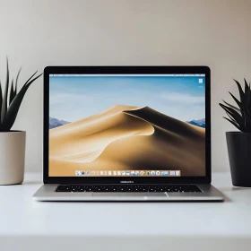 Modern Laptop with Desert Screen on Minimalist Desk