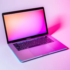 Sleek Laptop with Pink and Purple Gradient