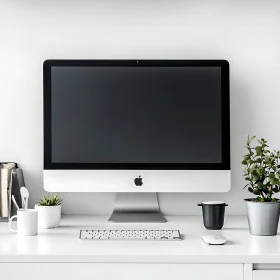 Stylish Workspace with Apple Computer and Indoor Plants