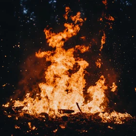 Intense Nighttime Blaze with Illuminated Embers
